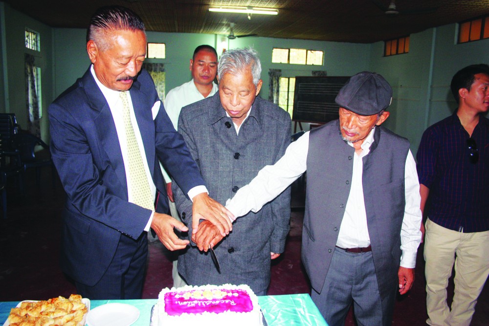 Symbolic yet significant moment in the Naga reconciliation process. Seen here NSCN/GPRN Chairman Isak Chishi Swu and GPRN/NSCN Chairman Gen Khole Konyak together cutting the Reconciliation cake during a get together of the Naga groups at Bade, Dimapur on Saturday. Also seen assisting the two leaders is FNR Convenor Dr. Wati Aier.